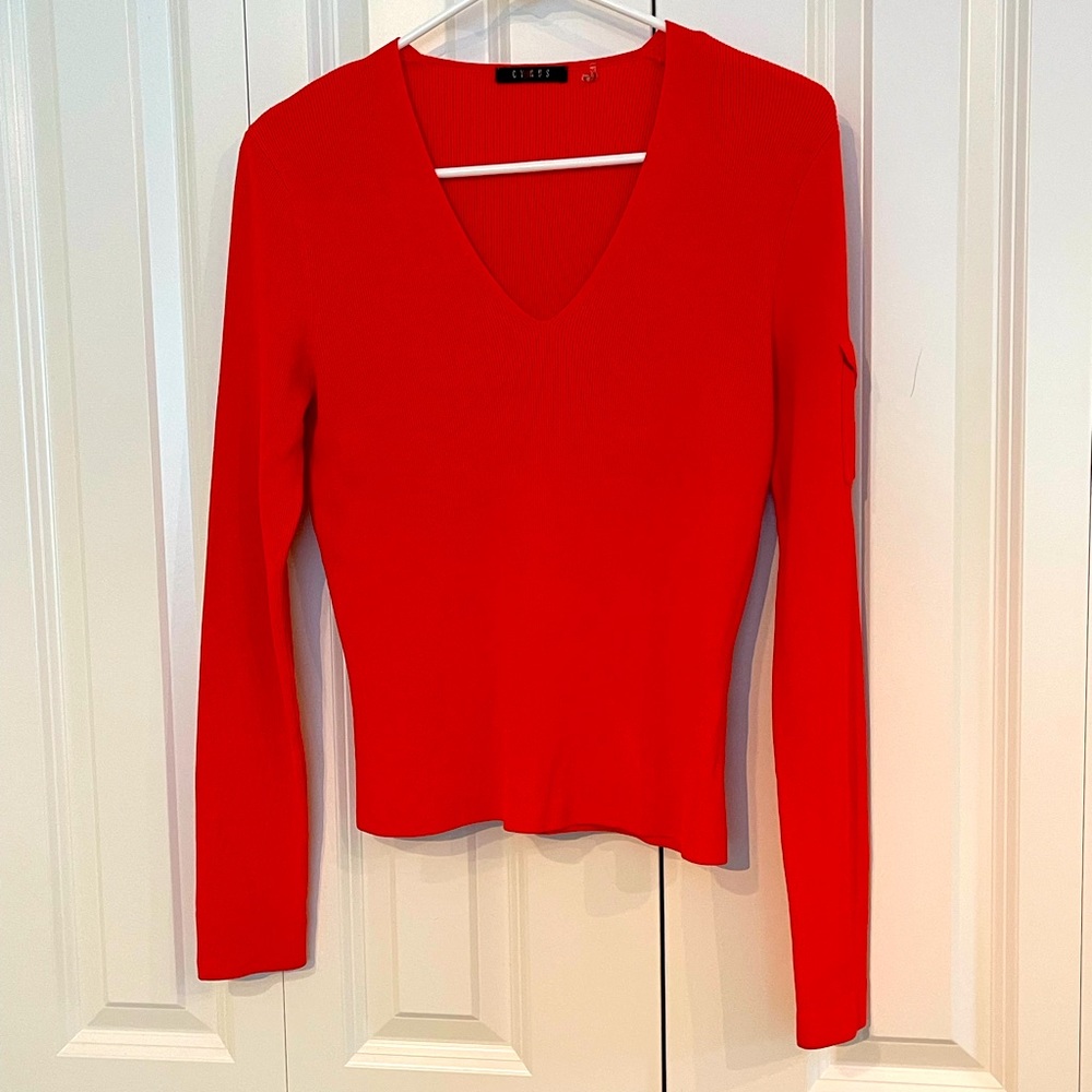 Nice knit top, bright orange. Great fall color